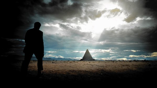 Neil deGrasse Tyson approaches the animated Halls of Extinction