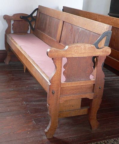 Pew in Little Church, in Keystone, Nebraska. Photograph: Ammodramus via Wikimedia Commons.