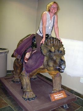 The author's wife astride a ceratopsian.