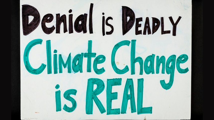 Denial Is Deadly, Climate Change is Real sign.