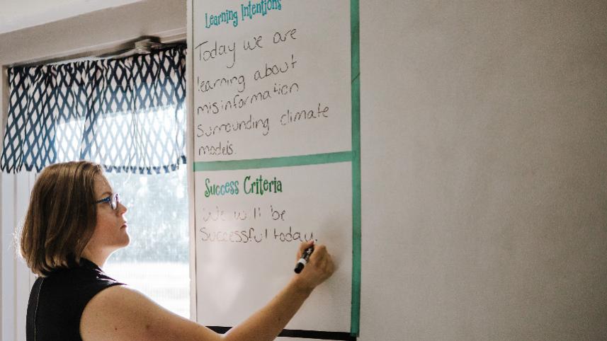 Middle school teacher Sarah Ott plans her instructional day.