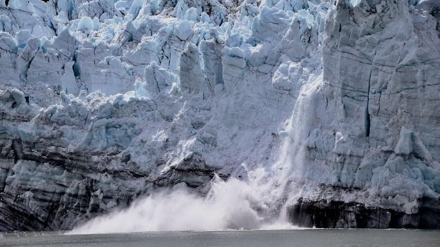 A glacier calving.